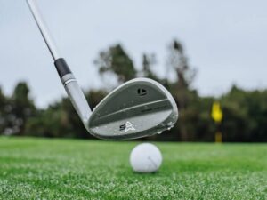Clean Strikes on Saturated Fairways: How to Master Ball-First Iron Contact in Wet Weather